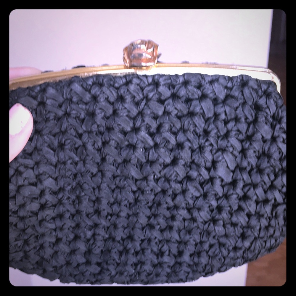 MM Small black clutch with Rose snap closure